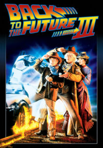 Michael J. Fox as Marty McFly in a cowboy hat and Christopher Lloyd as Doc Brown in 1885 Western clothing.