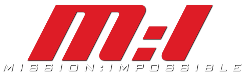 Tom Cruise as Ethan Hunt hanging from a wire in a high-security vault in Mission: Impossible.