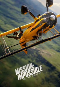 Tom Cruise as Ethan Hunt riding a motorcycle off a cliff in Mission: Impossible - Dead Reckoning Part Two.