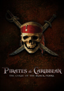 Johnny Depp as Captain Jack Sparrow standing on the mast of a ship in Pirates of the Caribbean.